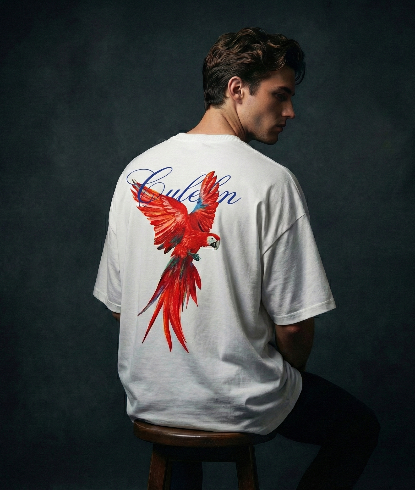 red macaw design on the back of T shirt